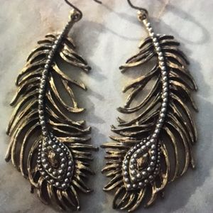 Metal gold tone feather earrings